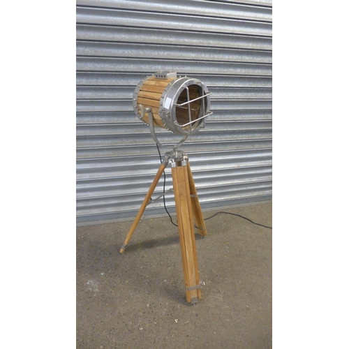 2136 - An industrial style oak tripod floor lamp