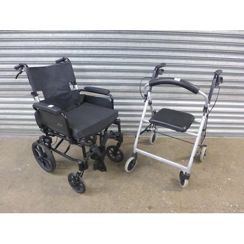 2138 - An R Healthcare small wheel operator driven wheelchair with footrests and a Days walking aid/rollato... 