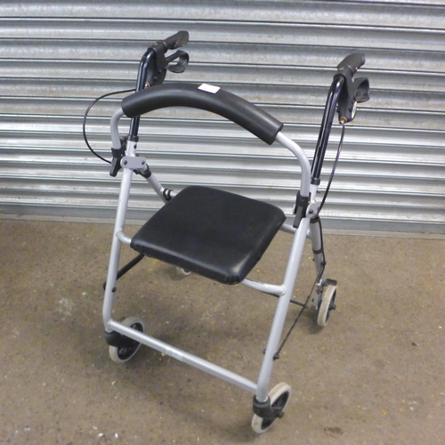 2138 - An R Healthcare small wheel operator driven wheelchair with footrests and a Days walking aid/rollato... 