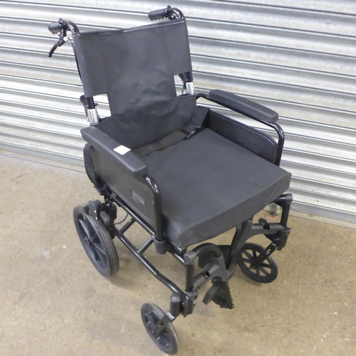 2138 - An R Healthcare small wheel operator driven wheelchair with footrests and a Days walking aid/rollato... 