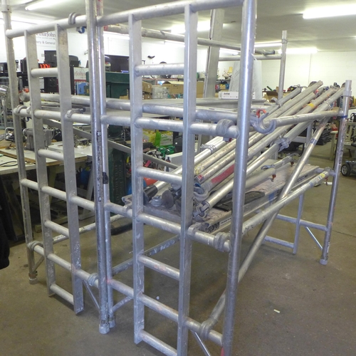 2146 - A Youngman Boss aluminium scaffold tower with side panels, wheels, stabilisers, support bars and wor... 