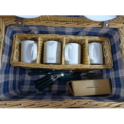 2327 - A wicker picnic basket set including plates cups knifes forks and spoons with a wicker wine bottle b... 