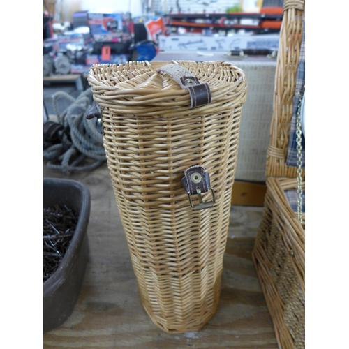 2327 - A wicker picnic basket set including plates cups knifes forks and spoons with a wicker wine bottle b... 