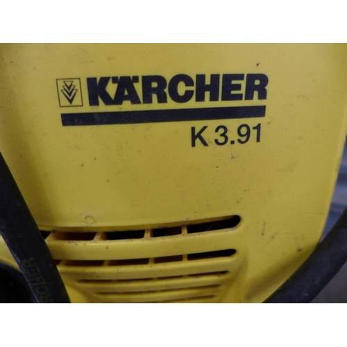 2347 - A Karcher K3.91 jet wash with hose and lance