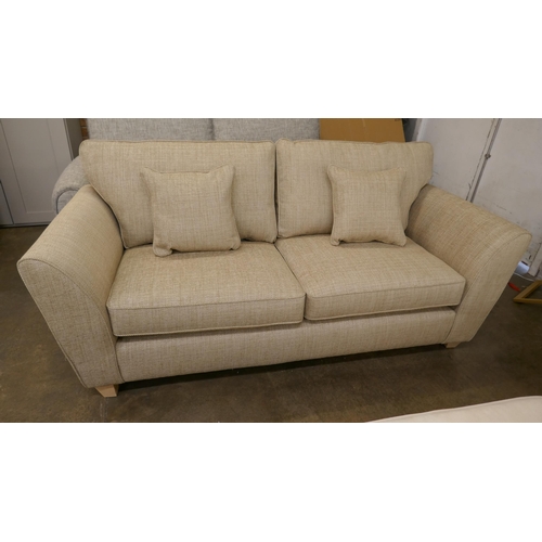 1495 - A gold weave three seater sofa - brand new