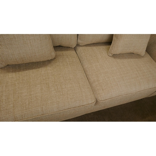 1495 - A gold weave three seater sofa - brand new