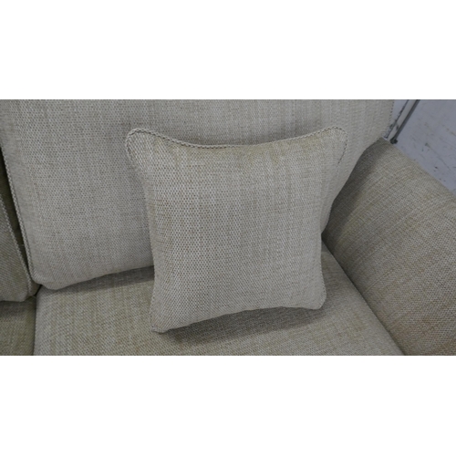 1495 - A gold weave three seater sofa - brand new