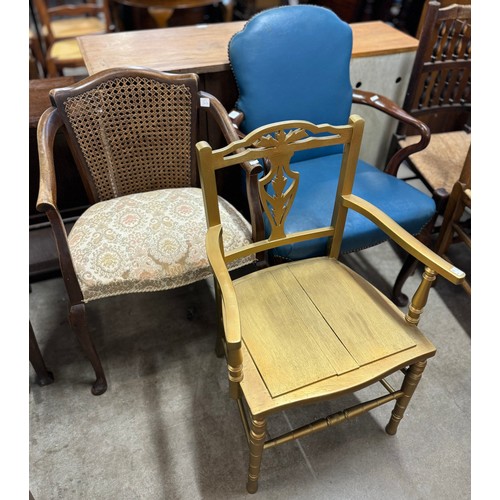 239 - An early 20th century bergere elbow chair, a painted side chair and a George III mahogany elbow chai... 