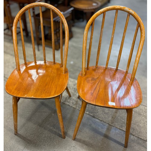 244 - A pair of Ercol style elm and beech chairs