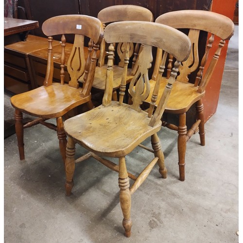 192 - A Harlequin set of four Victorian elm and beech kitchen chairs