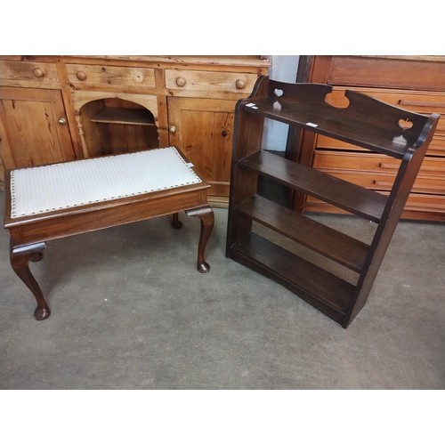 193 - An Arts & Crafts oak open bookcase and a mahogany duet stool