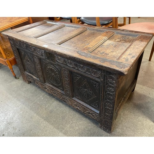 118 - A Charles II carved oak coffer