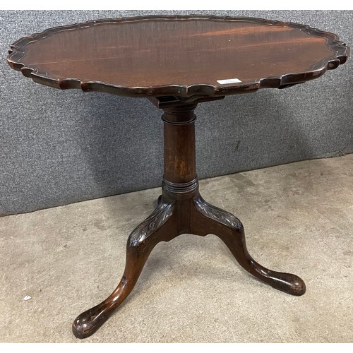 121 - A 19th Century Chippendale style carved mahogany bird cage action tripod tea table