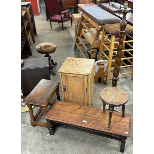 219 - A carved oak standard lamp, a 17th Century style joint oak stool, a Victorian ash pot cupboard and a... 