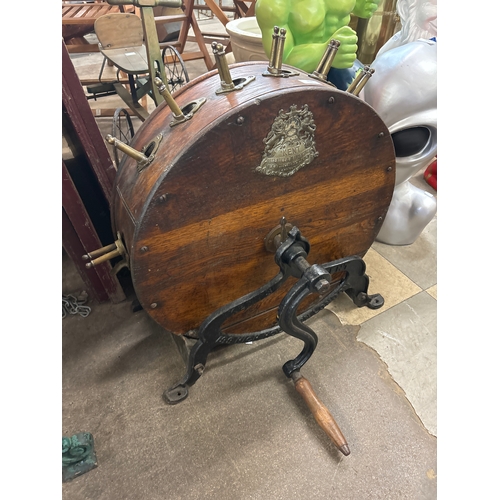 263 - An early 20th Century oak knife sharpener