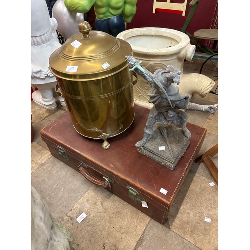 274 - A leather suitcase, a spelter figure of a cavalier and a brass coal bin