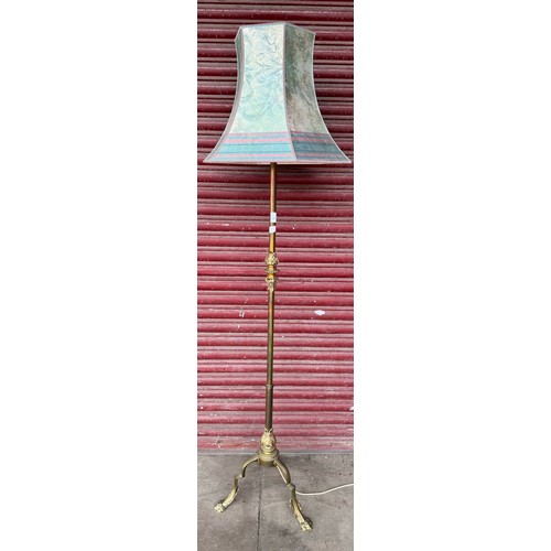 226 - An Art Nouveau style brass standard lamp