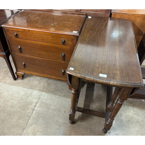 230 - An Art Deco oak chest of drawers and an oak gateleg table