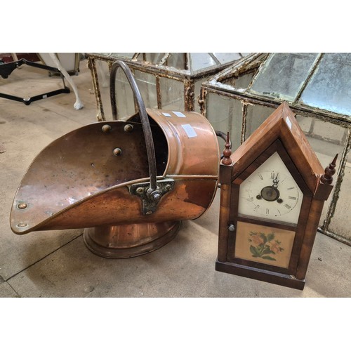 282 - A Victorian copper coal bucket and an American mantle clock