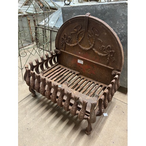 285 - A Victorian style cast iron fire grate