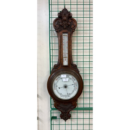 341 - An early 20th Century oak aneroid barometer