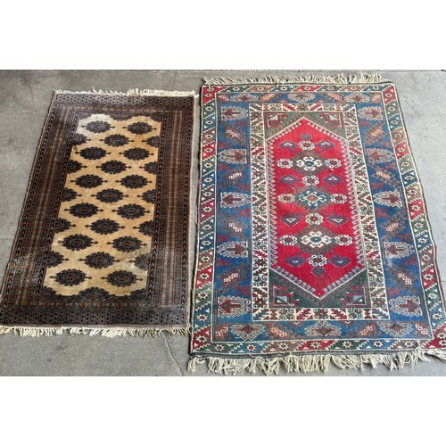 235 - Two Eastern rugs (165cm x 90cm) (190cm x 122cm)