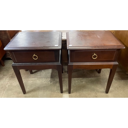 249A - A pair of Stag Minstrel mahogany bedside tables