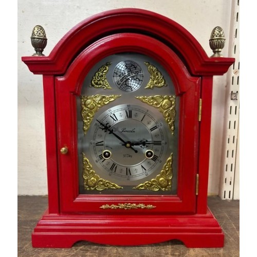 350 - A red Chinese style mantel clock