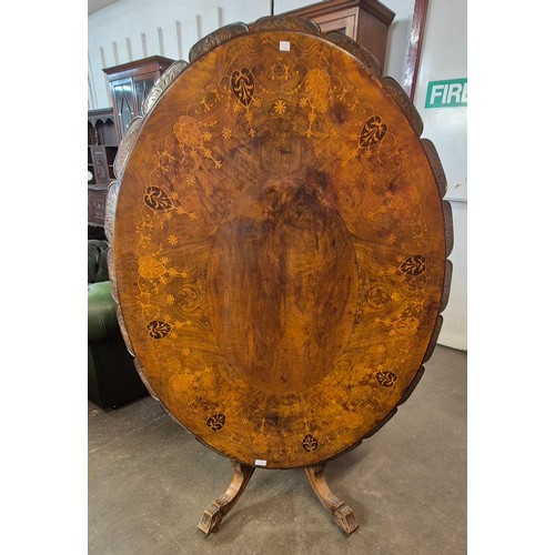 116 - A Victorian inlaid bur walnut oval tilt top loo table