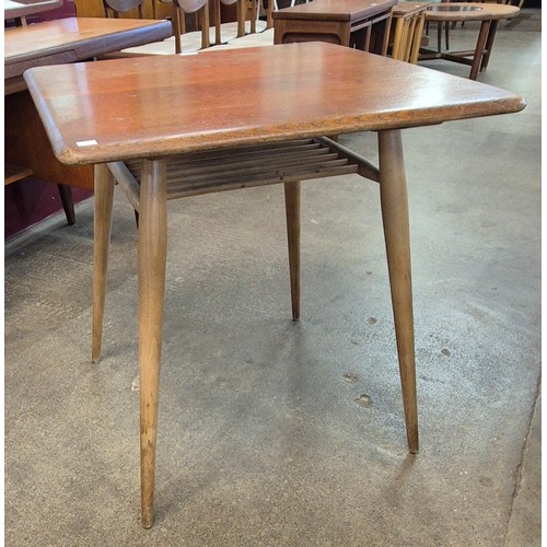 21 - An Ercol Blonde elm and beech Windsor table