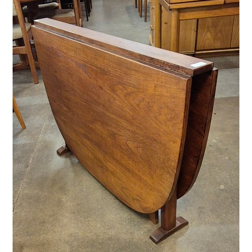 57 - A slim teak drop leaf table