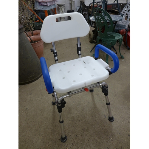 2233 - A three wheeled mobility walking frame and shower stool