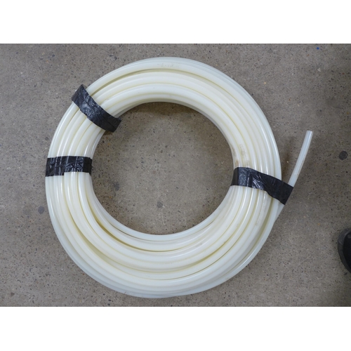 2260 - A large quantity of  under floor heating UPVC pipe with a quantity of clips