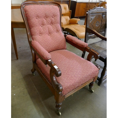 121A - A William IV carved mahogany reclining armchair