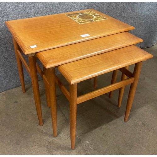 6 - A Danish teak and tiled top nest of tables