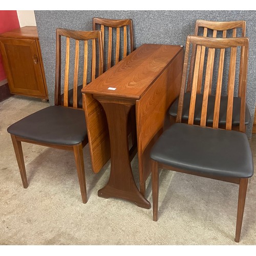 11 - A G-Plan Fresco teak drop leaf table and four chairs