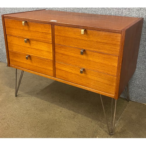 8 - A teak chest of drawers, on chrome hair pin legs