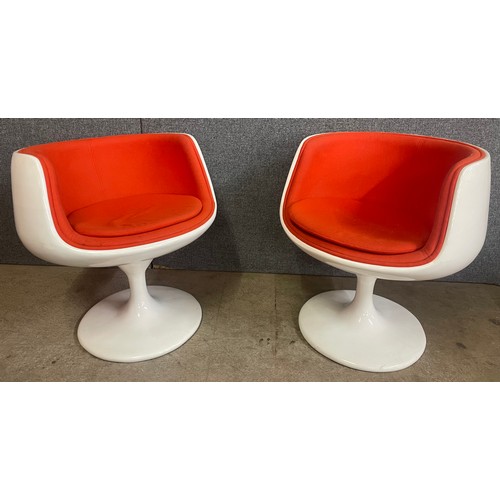 12 - A pair of Finnish Asko white fibreglass and orange fabric upholstered Cognac chairs, designed by Eer... 