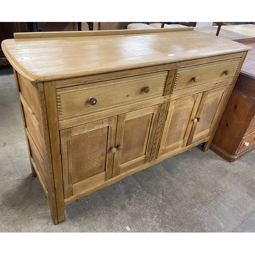 155 - An elm sideboard