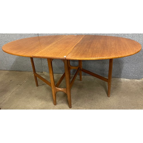 29 - A teak drop leaf table