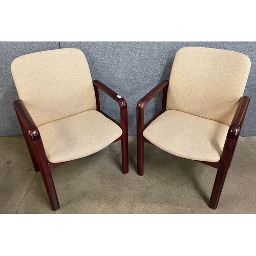 31 - A pair of Danish Benny Linden teak and fabric upholstered armchairs