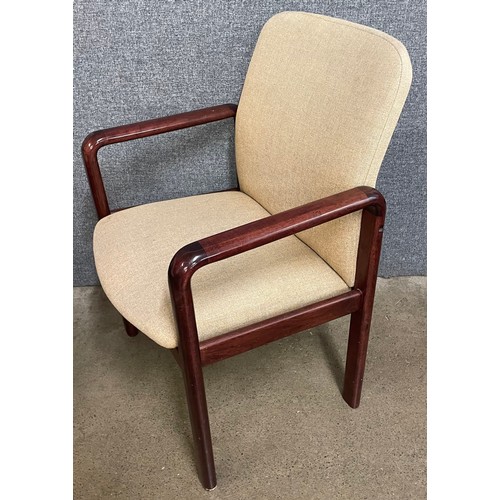 31 - A pair of Danish Benny Linden teak and fabric upholstered armchairs