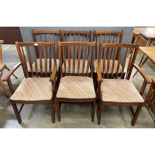 33 - A set of six teak dining chairs