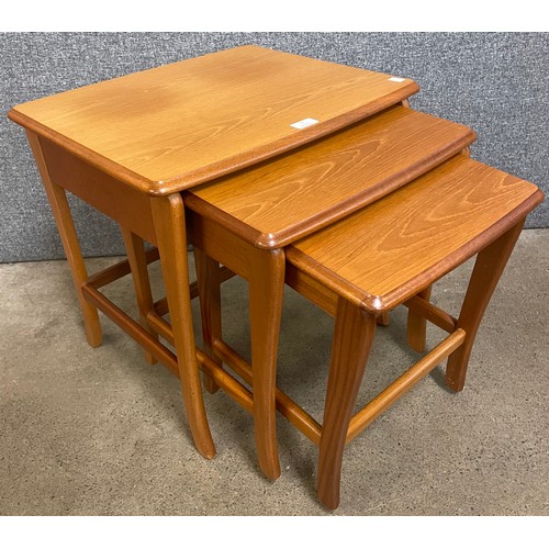 34 - A teak nest of tables