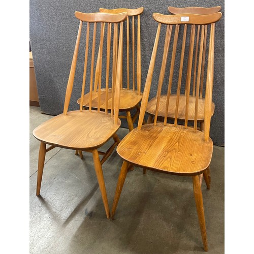 37 - A set of four Ercol Blonde elm and beech Goldsmith chairs