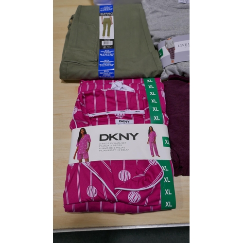 6287 - A pallet of clothing to include: Adidas, DKNY, Ted Baker, Dewalt, Lacoste, etc.   (329-289,290)   * ... 