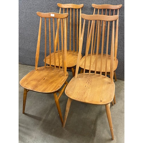 39 - A set of four Ercol Blonde elm and beech Goldsmith chairs