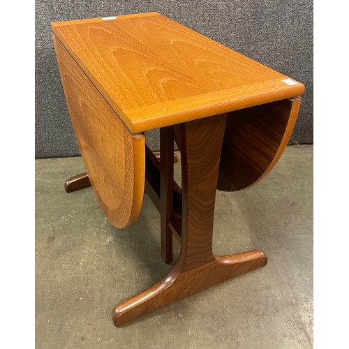 40 - A Parker Knoll teak drop leaf coffee table