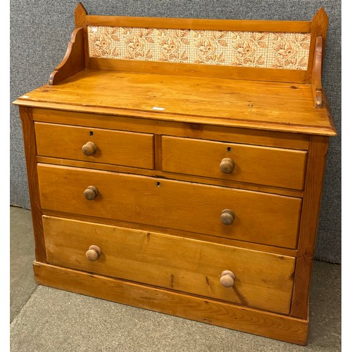 104 - A Victorian pine and tiled back chest of drawers