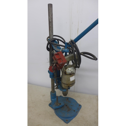 2004 - A pedestal drill vice with drill chuck key